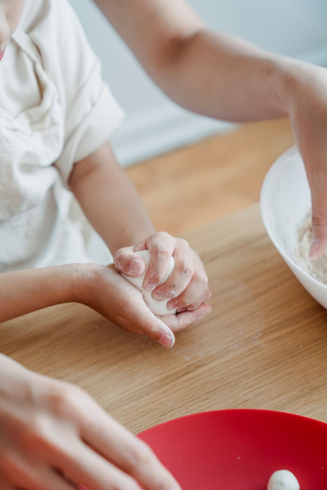 Aisha teaching a hands-on baking class
